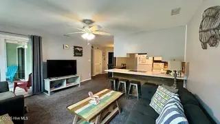 9201 Coast Guard Road E-101, Emerald Isle, NC 28594 – photo 23: den to dining