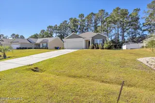 205 Wild Raven Street NW, Shallotte, NC 28470 — 3-bedroom home in Wildwood Village, Shallotte, NC, photo 3 of 37: 35-Final 205 Wild Raven St NW -RJREM-511