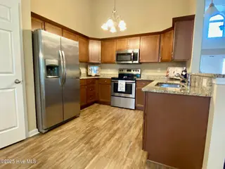 11 Court 11 Northwest Drive NW, Carolina Shores, NC 28467 — 3-bedroom home in Carolina Shores, Carolina Shores, NC, photo 10 of 28: 11-Kitchen