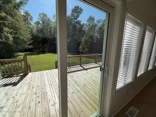 103 Castelnau Court, Jacksonville, NC 28540 — 5-bedroom home in Williamsburg Plantation, Jacksonville, NC, photo 17 of 52: 8. View from Sunroom