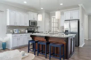 4010 Druids Glen Drive, Leland, NC 28451 – photo 12: Kitchen Island w/ Bar Seating
