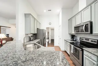 8112 Saltcedar Drive, Wilmington, NC 28411 – photo 12: Kitchen w/ S/S Appliances