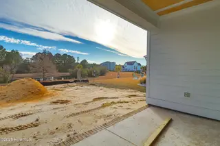 205 Cumberland Street, Newport, NC 28570 – photo 20: Back porch overlooking pond
