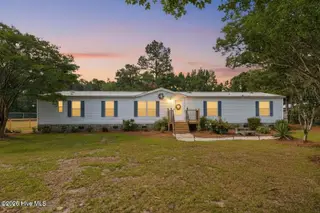 1199 Zack Street SE, Bolivia, NC 28422 — 4-bedroom manufactured home in Sandy Branch Retreat, Bolivia, NC, photo 2 of 44