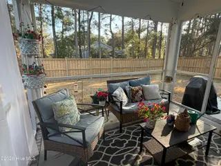 2487 Lake Ridge Drive, Southport, NC 28461 – photo 4: Screened Porch