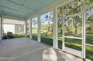 1564 St Lucia Drive SW, Shallotte, NC 28470 – photo 3: Screened patio