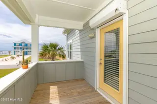 139 Sound Point Drive, Harkers Island, NC 28531 – photo 24: Deck off Principle Bedroom