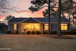 613 Long Leaf Acres Drive, Wilmington, NC 28405 – photo 1: 613LongLeafFront_Dusk