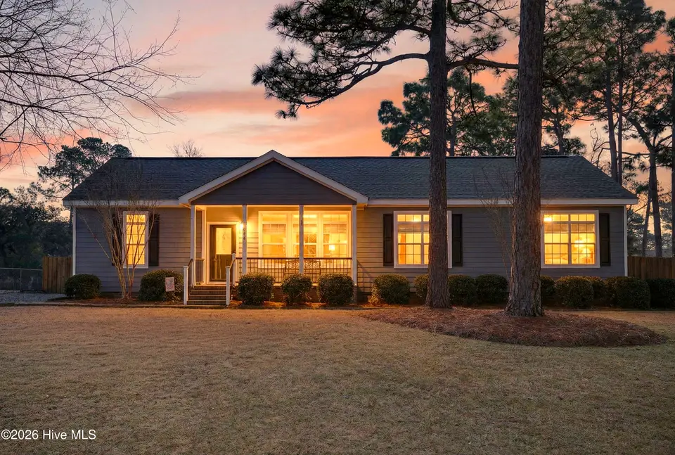613 Long Leaf Acres Drive, Wilmington, NC 28405 – photo 1 of 47: 613LongLeafFront_Dusk