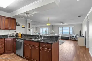 1505 Salter Path Road 304, Indian Beach, NC 28512 — 2-bedroom condo in Summer Winds Condominiums, Indian Beach, NC, photo 14 of 53: Kitchen & Living Area