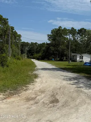 2286 Barnacle Drive SW, Supply, NC 28462 — 1-bedroom home in Sea Castles, Supply, NC, photo 3 of 56: Barnacle down the street