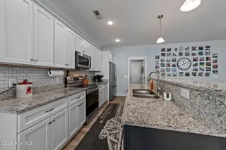9329 National Avenue NE, Leland, NC 28451 – photo 10: 33-web-or-mls-CZ9A9532
