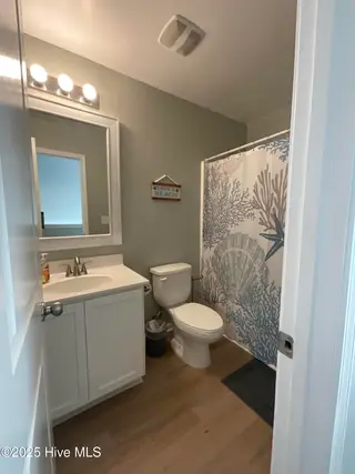 93 Shamrock Drive SW, Sunset Beach, NC 28468 – photo 12: Bathroom 3
