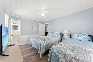 392 E First Street, Ocean Isle Beach, NC 28469 – photo 19: Front side - 3rd bedroom