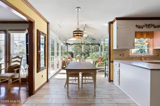 3232 Grey Leaf Drive, Wilmington, NC 28409 — 4-bedroom home in Woodberry Forest, Wilmington, NC, photo 14 of 51: 3232 Grey Leaf BN to sunroom