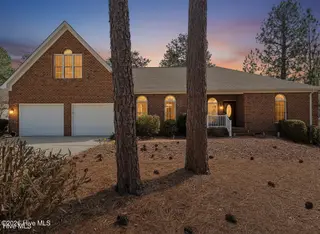 135 Fawnwood Drive, Seven Lakes, NC 27376 – photo 1: sunsetfront