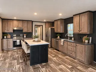 490 Wineview Court SE, Bolivia, NC 28422 — 5-bedroom manufactured home in Vineyard Landing, Bolivia, NC, photo 2 of 4: Kitchen