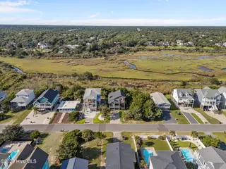 312 E Dolphin Drive, Oak Island, NC 28465 – photo 14: 15-web-or-mls-DJI_20250826171016_0130_D