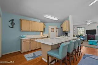 109 NE 1st Street, Oak Island, NC 28465 – photo 13: 31-web-or-mls-DSC03824