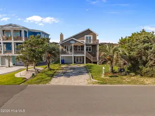 312 E Dolphin Drive, Oak Island, NC 28465 – photo 2: 2-web-or-mls-DJI_20250826170745_0115_D
