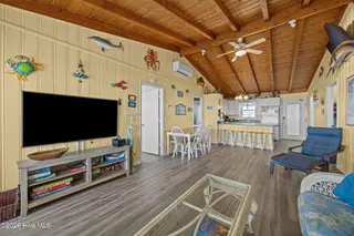 1011 W Beach Drive, Oak Island, NC 28465 – photo 10: 37-web-or-mls-IMG_2422