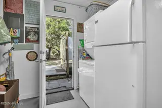 209 NE 56th Street, Oak Island, NC 28465 – photo 18: 14-Final 209 NE 56th St OKI-RJREM-9396