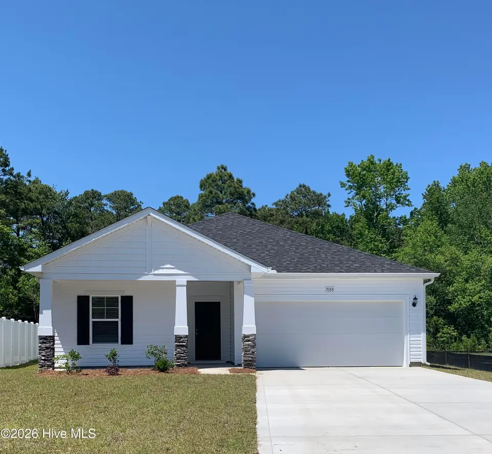 7155 Woodline Drive SW, Sunset Beach, NC 28468 – photo 1 of 2: Exterior Photo