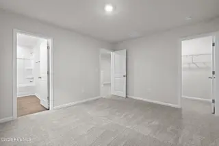 806 Palm Frond Way NW, Calabash, NC 28467 – photo 21: Bedroom 2 in rear of house with full bat