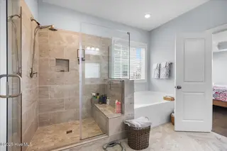611 Edgerton Drive, Wilmington, NC 28412 – photo 20: Frameless shower with bench