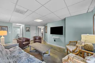 5419 W Beach Drive, Oak Island, NC 28465 – photo 24: 23_family room