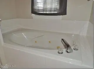 4311 Portsmouth Drive NW, Wilson, NC 27896 – photo 23: 22 Master Bathroom Jetted Tub