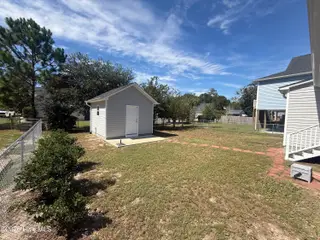 115 NW 17th Street, Oak Island, NC 28465 — 2-bedroom home in Pinners Point, Oak Island, NC, photo 7 of 7: Rear Yard