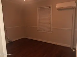 1409 Rhem Street, Kinston, NC 28501 – photo 11: 1409 Rhem Street middle bedroom_laundry