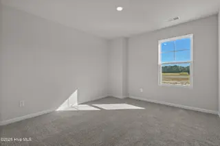 313 Parkington Lane 86a, Ocean Isle Beach, NC 28469 – photo 23: upstairs bedroom