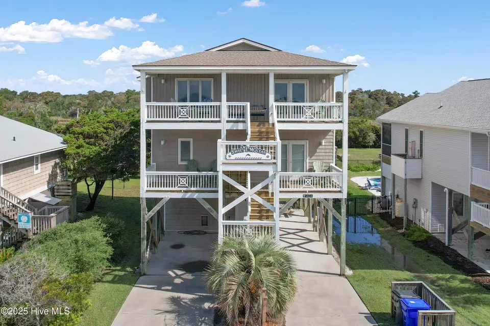 1404 E Dolphin Drive, Oak Island, NC 28465 – photo 1 of 42: 1404EDolphinDr - 2
