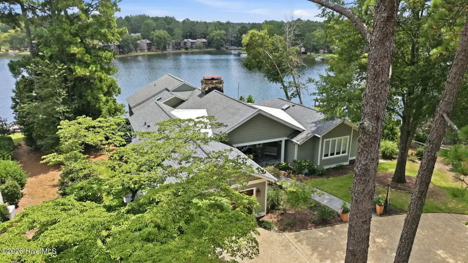 660 Lake Forest Drive SE, Pinehurst, NC 28374 – photo 1 of 64: 4-web-or-mls-DJI_20260803134218_0153_D