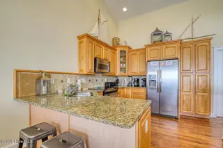 1302 New River Inlet Road, North Topsail Beach, NC 28460 – photo 17: The Greenwood Kitchen View 3