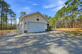 1281 Spring Lake Drive, Southport, NC 28461 — 3-bedroom home, Southport, NC, photo 4 of 46: Spacious Driveway & Garage