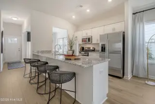 1149 Tennessee Walker Way, Bolivia, NC 28422 — 3-bedroom home in River Tide Farms, Bolivia, NC, photo 6 of 19: Kitchen