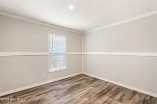 6745 Lewis Drive SE, Winnabow, NC 28479 – photo 24: guest bedroom