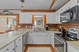 211 NE 55th Street, Oak Island, NC 28465 – photo 9: 21-web-or-mls-BTS08128