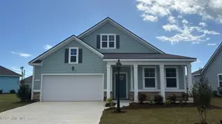 1228 Woodhouse Drive NW, Ash, NC 28420 – photo 1: Lot 20 - 1228 Woodhouse Drive