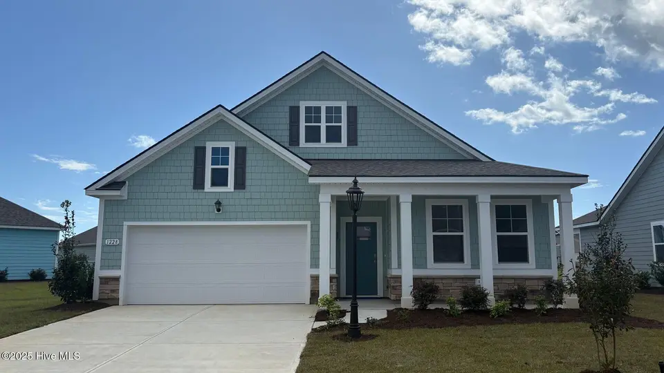 1228 Woodhouse Drive NW, Ash, NC 28420 – photo 1 of 31: Lot 20 - 1228 Woodhouse Drive