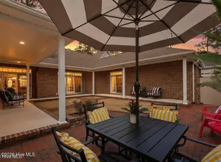 135 Fawnwood Drive, Seven Lakes, NC 27376 – photo 2: courtyardsunset