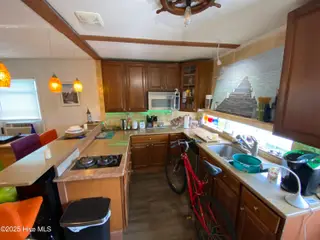 3518 E Beach Drive, Oak Island, NC 28465 – photo 12: IMG_4298