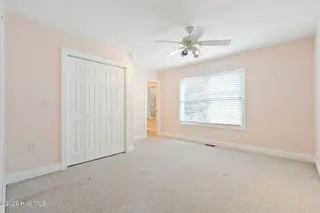 86 Plantation Passage Drive SE, Bolivia, NC 28422 — 4-bedroom home in Winding River Plantation, Bolivia, NC, photo 24 of 77: Bedroom 2