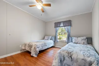 1109 Nautical Lane SW, Calabash, NC 28467 — 4-bedroom manufactured home in Village At Calabash, Calabash, NC, photo 22 of 34: Guest bed 1