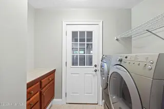 1714 Oakbrook Drive SW, Ocean Isle Beach, NC 28469 – photo 12: Laundry room