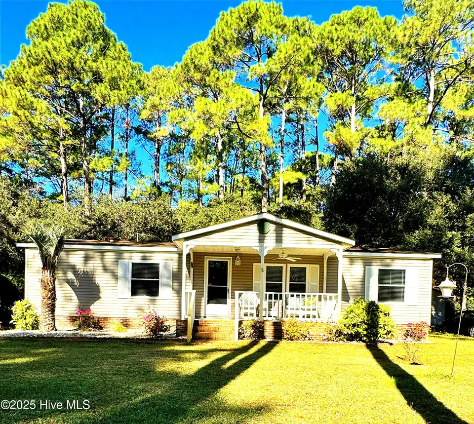 211 Beachwood Drive NW, Calabash, NC 28467 — 3-bedroom manufactured home in Ocean Forest, Calabash, NC, photo 1 of 75: House Front