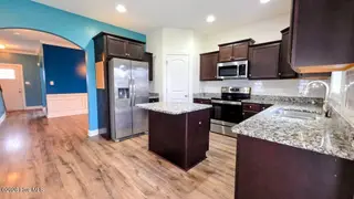 2007 Snapper Street, New Bern, NC 28562 — 4-bedroom home in Bluewater Rise, New Bern, NC, photo 3 of 31: 3 Kitchen w/ stainless steel appliances